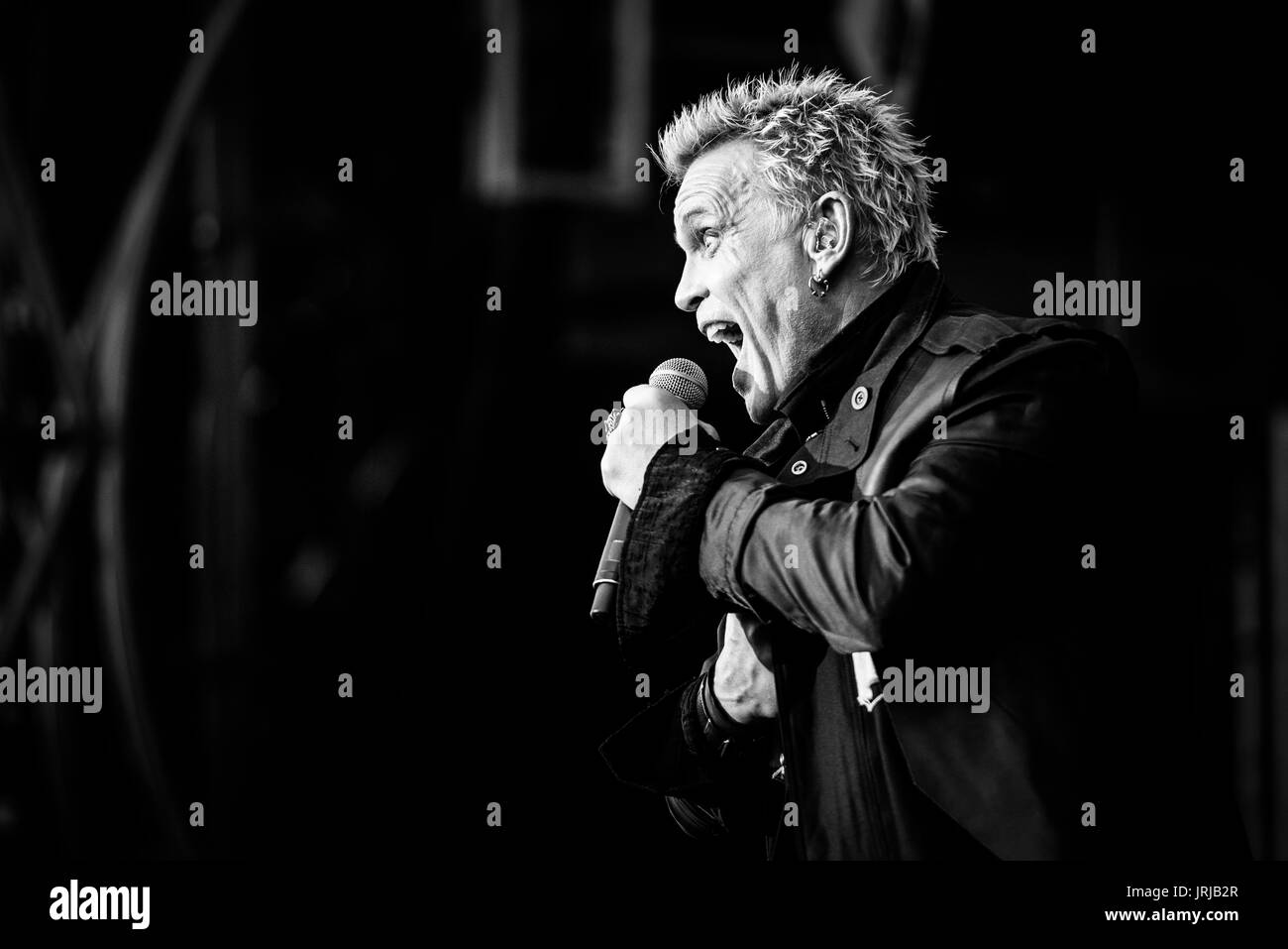 Billy Idol performing at a music festival in British Columbia Canada in black and white. Stock Photo