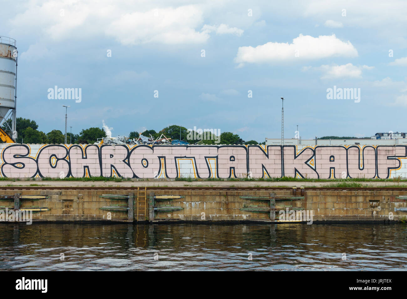 Grafitti advertising "Schrottankauf", a scrap dealer, in Berlin, Germany in July 2017. Stock Photo