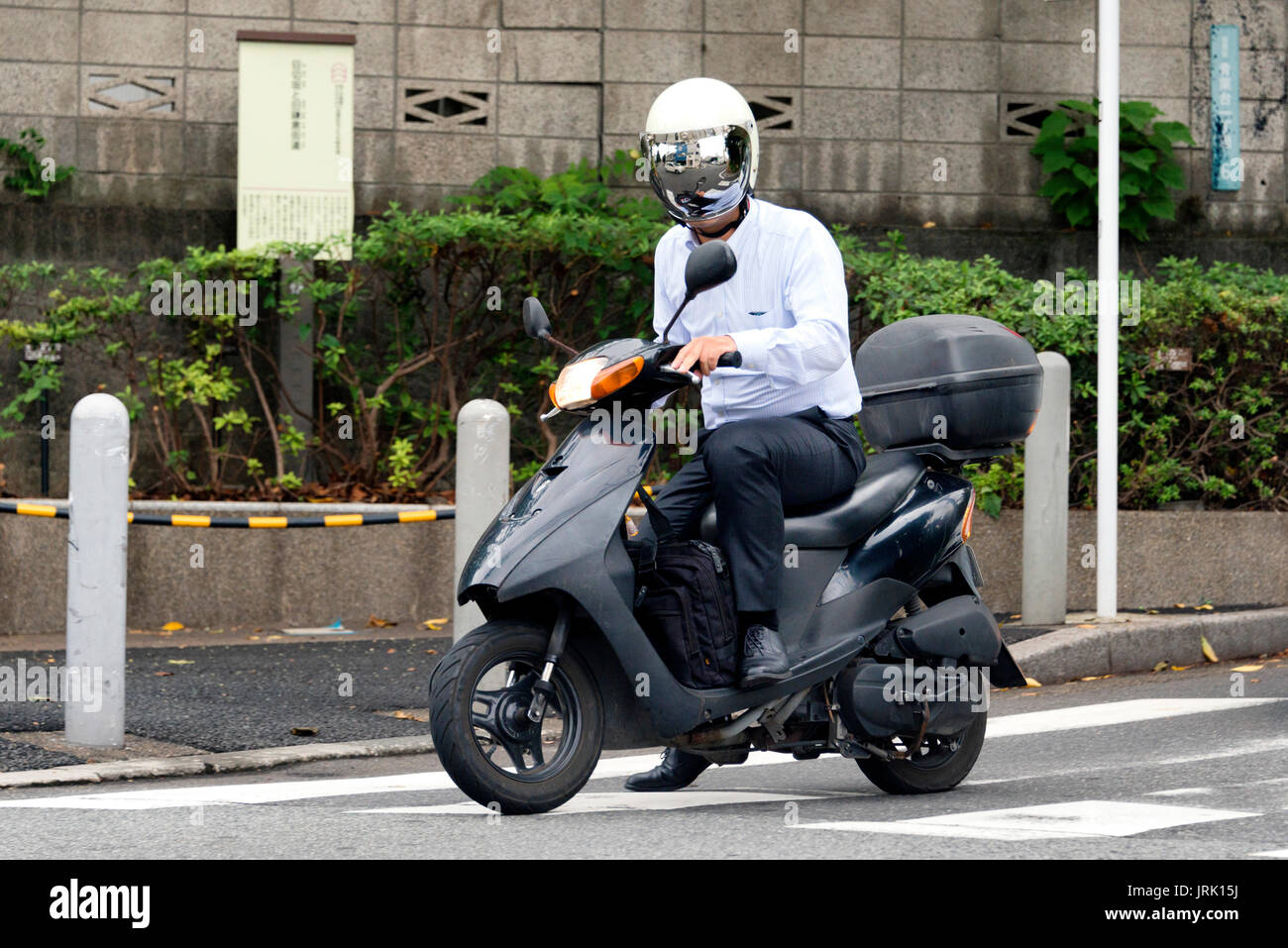 Tokyo scooter hires stock photography and images Alamy