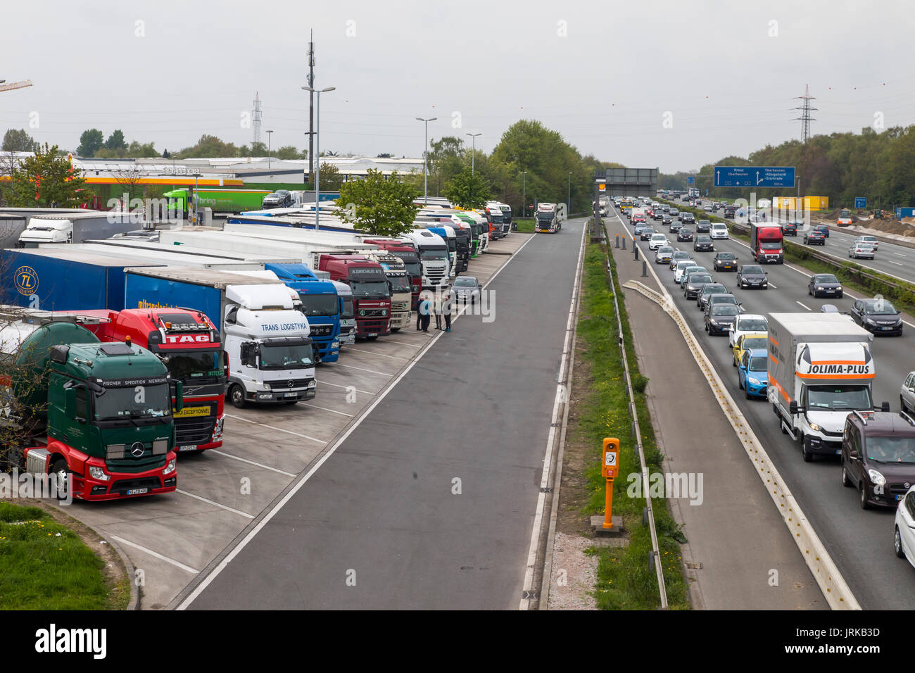 Highway, Autobahn service station,  BAB Tank- and Rasthof Bottrop Süd, on the A2 motorway, near Bottrop, Germany, full truck parking, Stock Photo