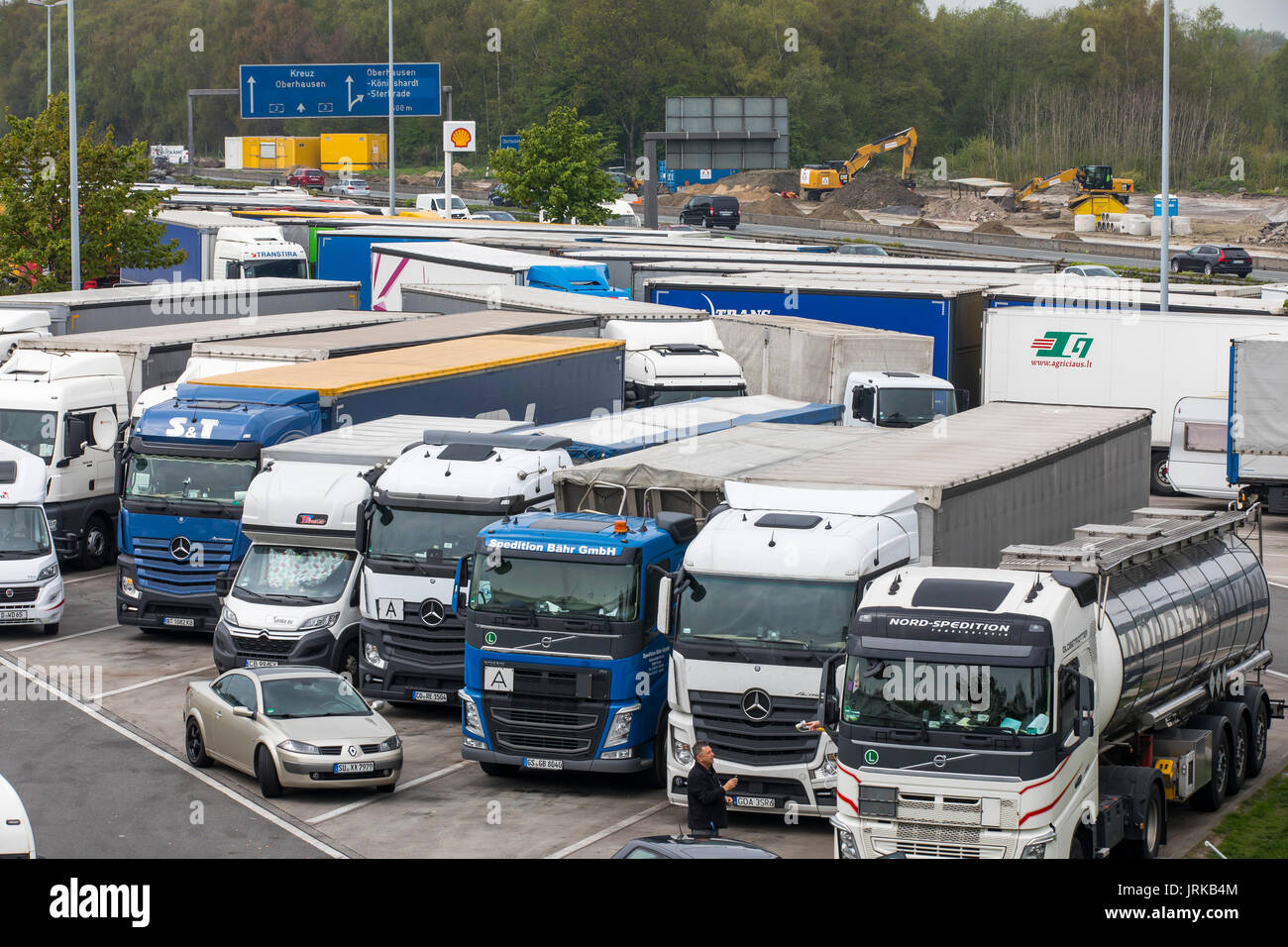 Highway, Autobahn service station,  BAB Tank- and Rasthof Bottrop Süd, on the A2 motorway, near Bottrop, Germany, full truck parking, Stock Photo