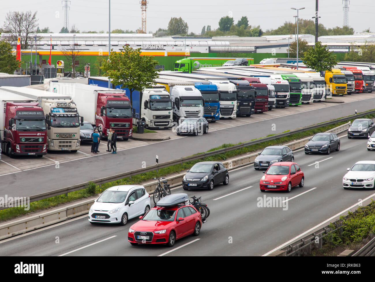 Highway, Autobahn service station,  BAB Tank- and Rasthof Bottrop Süd, on the A2 motorway, near Bottrop, Germany, full truck parking, Stock Photo