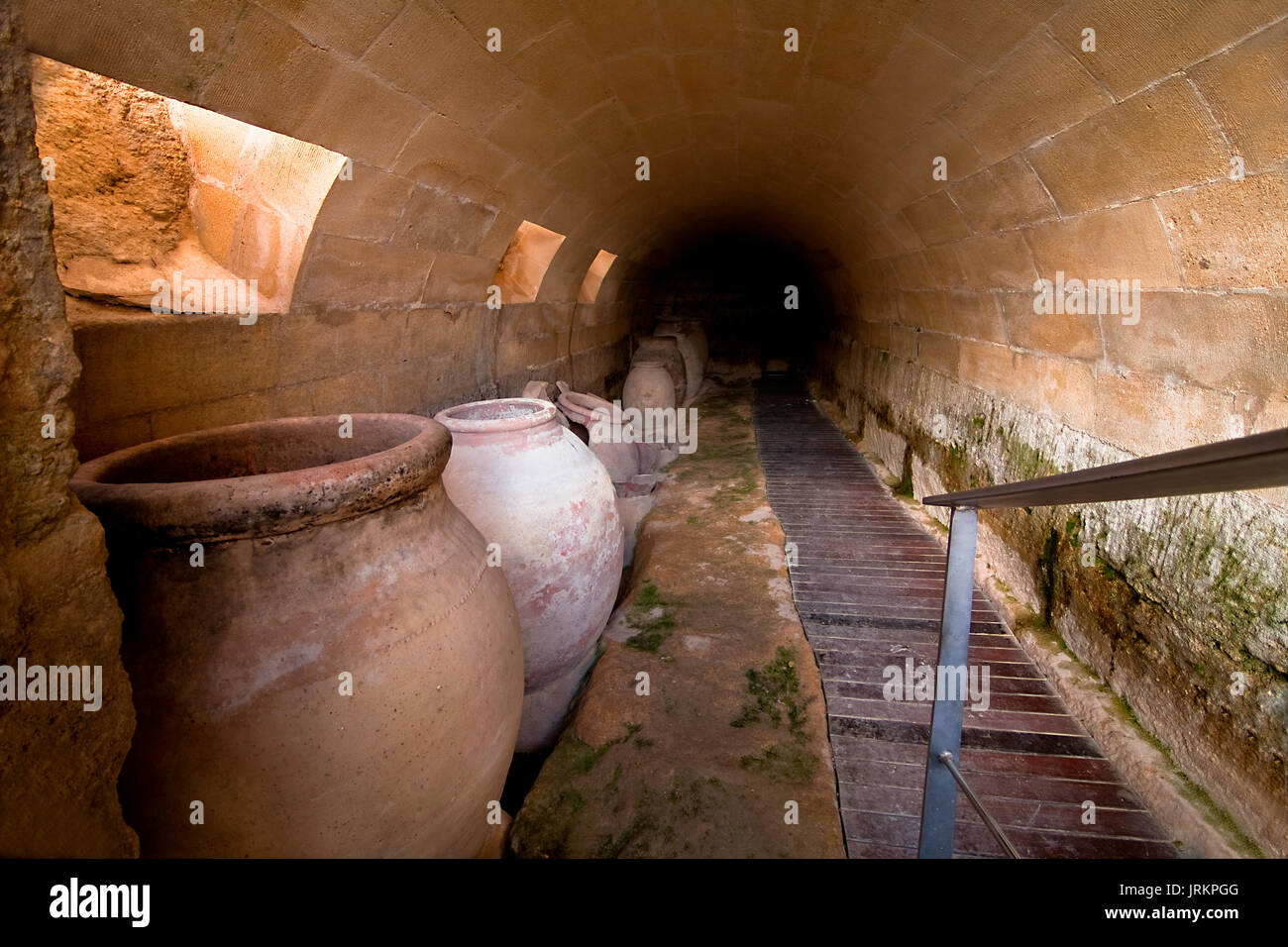 Jars of clay to preserve foods in the cellar. La Mota castle, Alcala la real, Jaen, Spain Stock Photo