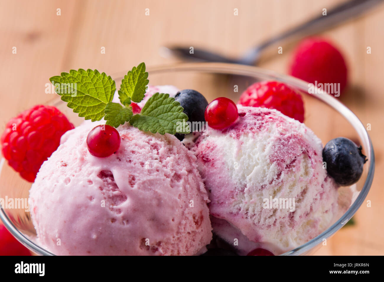 fruit flavored ice cream in glass bowl Stock Photo Alamy