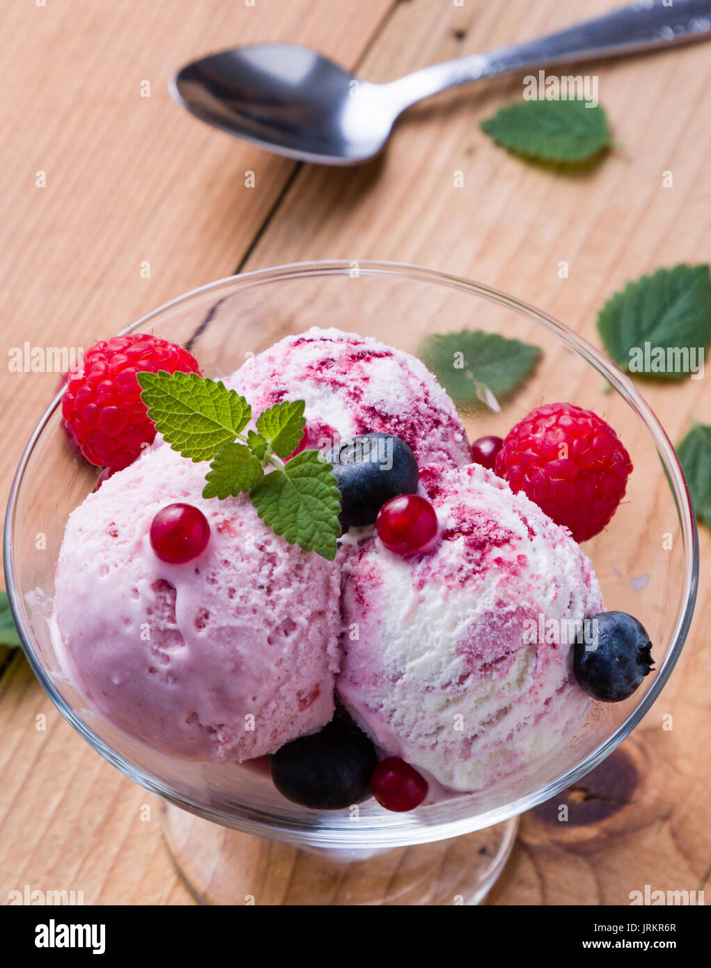 fruit flavored ice cream in glass bowl Stock Photo Alamy