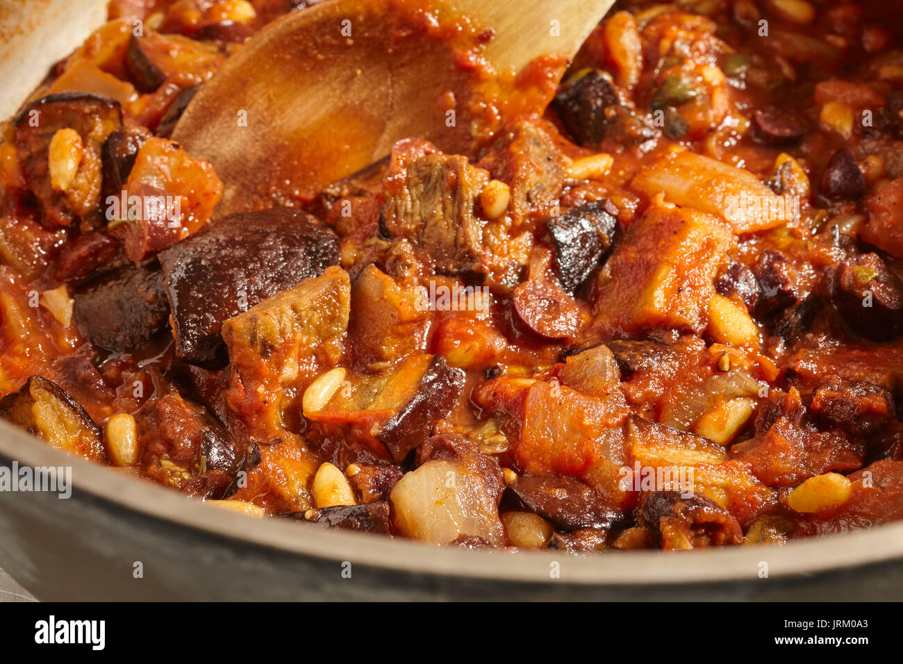Caponata, a stew of eggplant, tomato, raisins and pine nuts, from