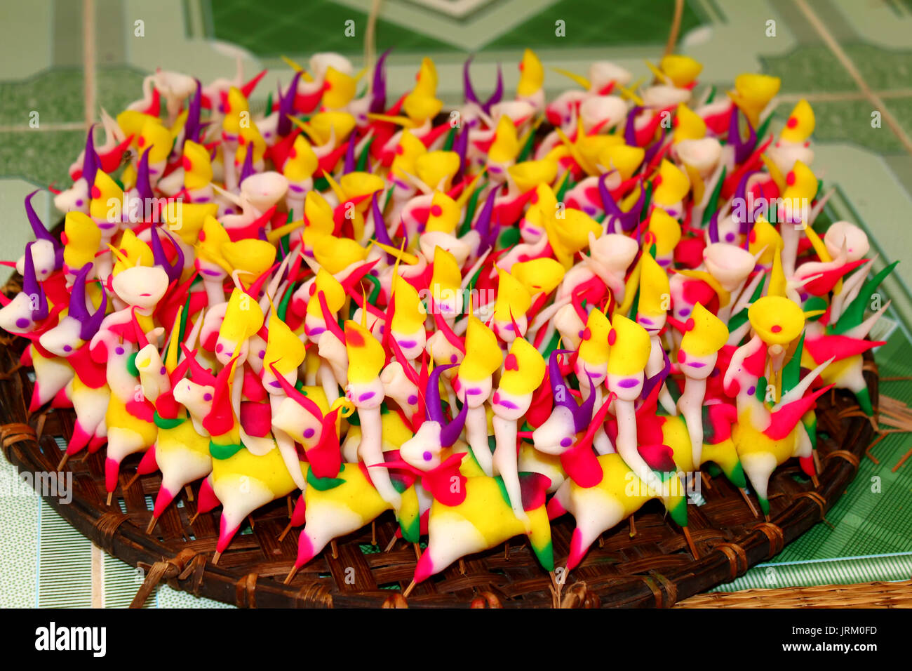 Tohe, the traditional toys in Vietnam made by colored rice powder Stock