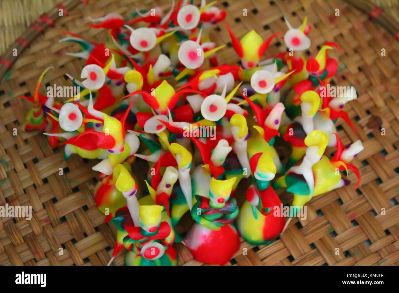 Tohe, the traditional toys in Vietnam made by colored rice powder Stock