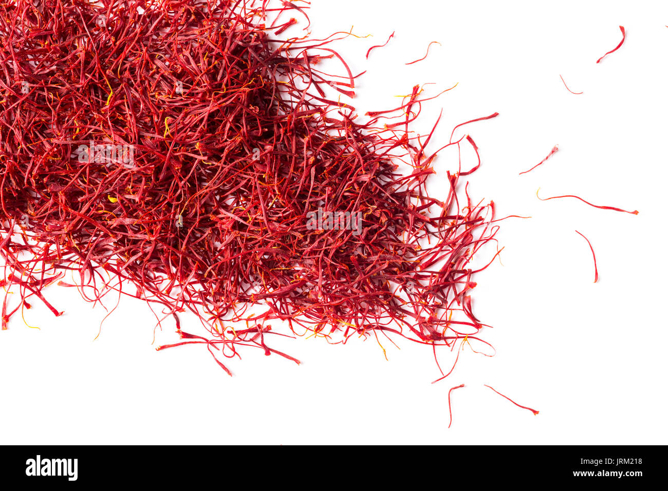 saffron crocus threads on isolated white background, view from above