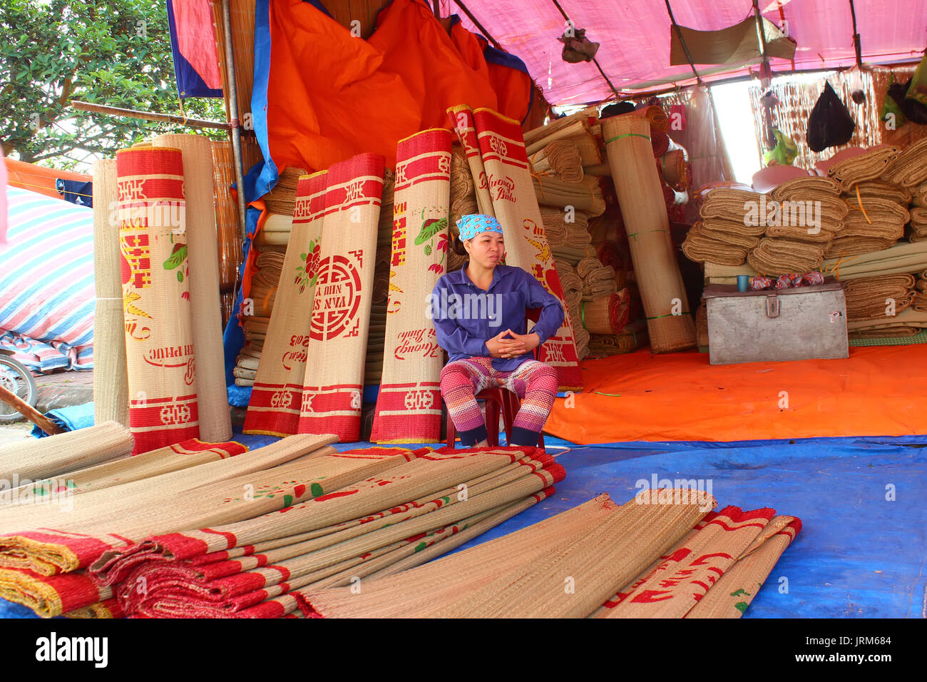 HAI DUONG, VIETNAM, SEPTEMBER, 3: people at Market selling bed mats on September, 3, 2014 in Hai Duong, Vietnam Stock Photo