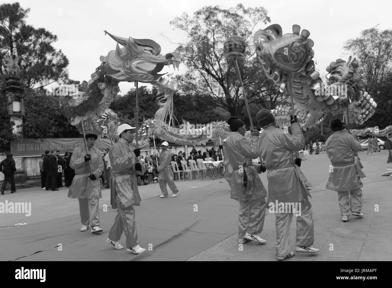 HAI DUONG, VIETNAM, February 14: a group of Asian people dance dragon in folk festivals on February 14, 2014 in Con Son pagoda, Hai Duong, Vietnam. Stock Photo