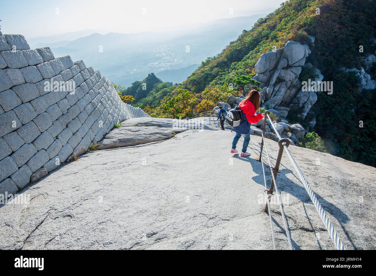 SEOUL, SOUTH KOREA - SEP 27: Climbers and Tourists on Bukhansan mountain. Photo taken on Sep 27, 2015 in Seoul, South Korea. Stock Photo