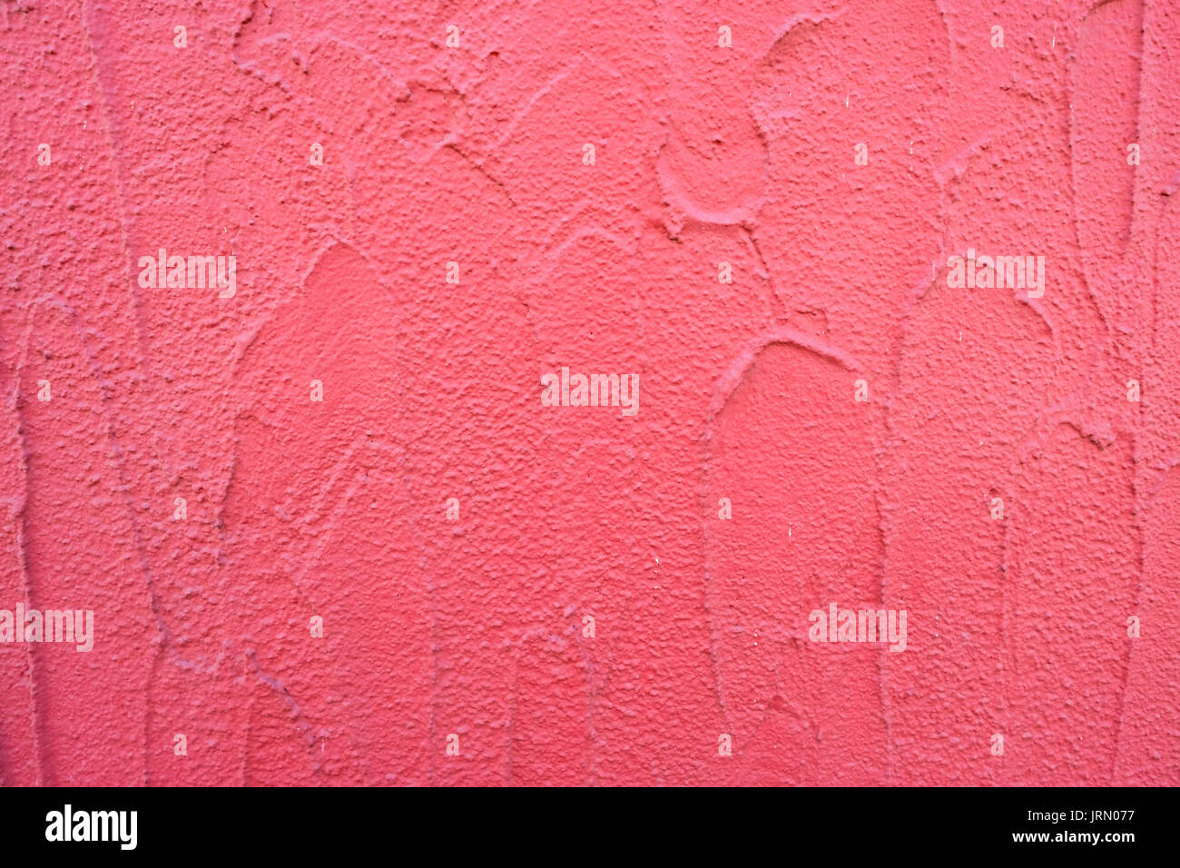 Wall of a facade with rough red plaster Stock Photo - Alamy