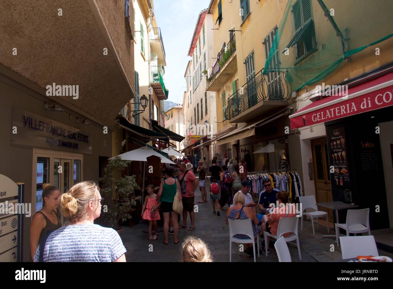 Tourists shopping on street in Beaulieu-sur-Mer, France Stock Photo