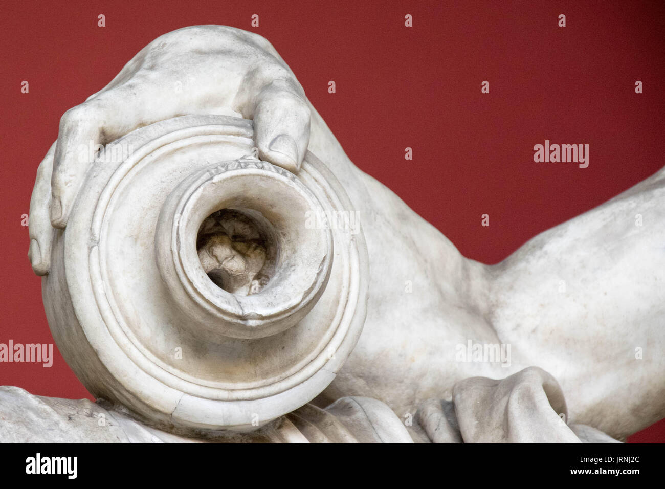 Detail of a lion's head carved inside a vase, Statue of the river god, (Arno);  Musei Vaticani, Vatican City. Taken with Nikon D5300 Stock Photo