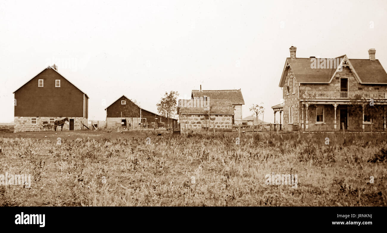 A farm on the Canadian Prairies,  early 1900s Stock Photo