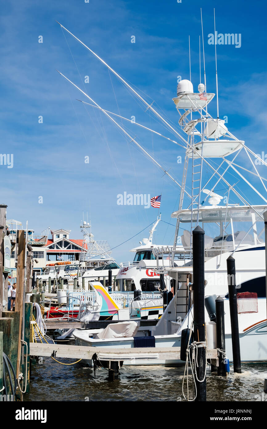 Destin sport and commercial fishing boats moored at the Harborwalk Marina in Destin, Florida USA. Stock Photo