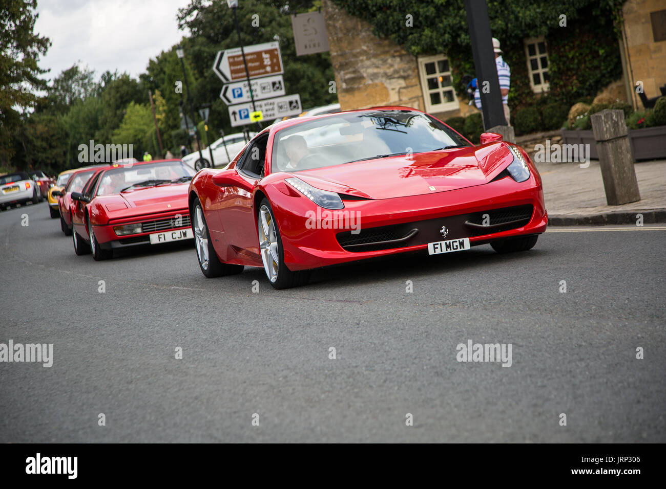 Cotswolds, UK. 06th Aug, 2017. a Ferrari458 Spider arriving for the Ferrari owners club meeting,where Ferrari car fans can get a closer look at the cars Credit: steven roe/Alamy Live News Stock Photo