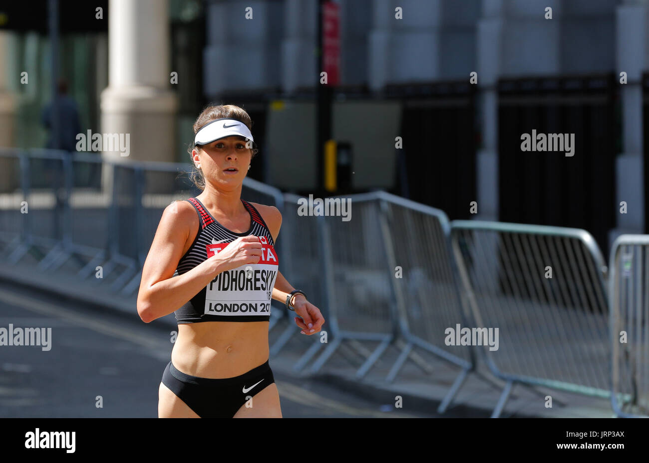 August 6th 2017 World Athletics Championship in London. IAAF women marathon 06/08/2017 started at 2pm local time. UK weather is perfect for a marathon with sun and few white clouds. Women running marathon are cometeing for a world champion title 2017. IAAF 2017 women marathon world champion and gold medal. Winner will be announced very soon. Stock Photo