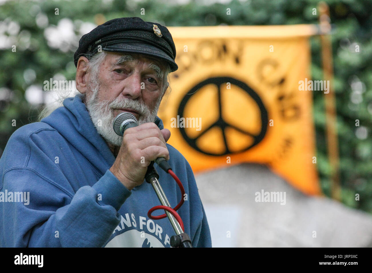 London, UK. 6th August, 2017. Jim Radford, D-Day veteran, folk singer and peace campaigner with Veterans for Peace, addresses peace campaigners attending the annual Hiroshima Day anniversary event in Tavistock Square, next to the commemorative Hiroshima cherry tree. Credit: Mark Kerrison/Alamy Live News Stock Photo
