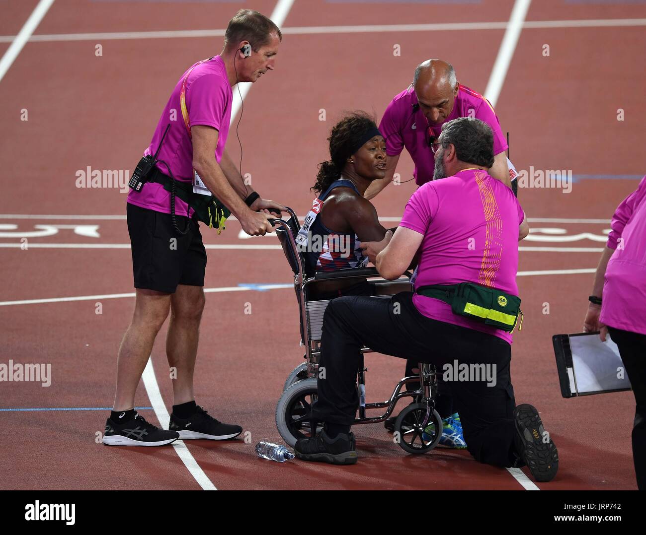 London, UK. 06th Aug, 2017. Antoinette Nana Djimou Ida (FRA) is put in a wheelchair at the end of her 800m in the womens heptathlon. IAAF world athletics championships. London Olympic stadium. Queen Elizabeth Olympic park. Stratford. Credit: Sport In Pictures/Alamy Live News Stock Photo