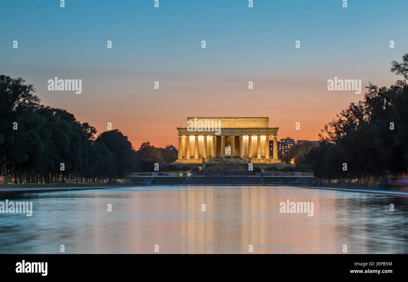 The Lincoln Memorial at Dusk with tourists flashing Stock Photo