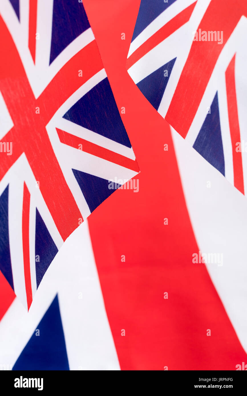 Cluster of mini Union Jack flags. Metaphor British patriotism, being patriotic, celebrating the Brit way of life, Rule Britannia, Union Jack abstract Stock Photo