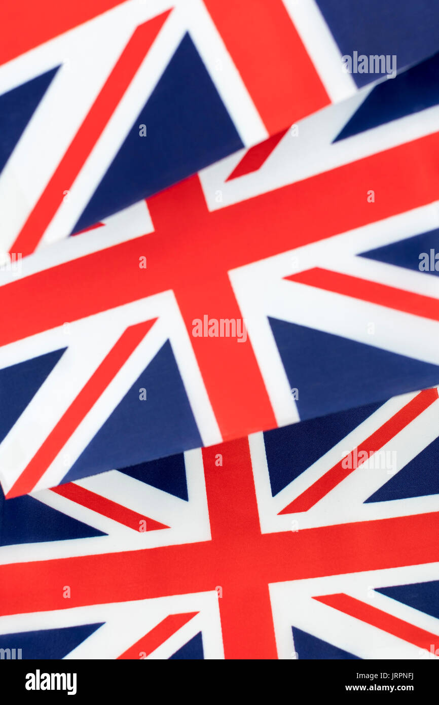 Clustered mini Union Jack flags. British patriots, being patriotic, celebrating Brit way of life, Rule Britannia, Union Jack abstract, Made in Britain Stock Photo