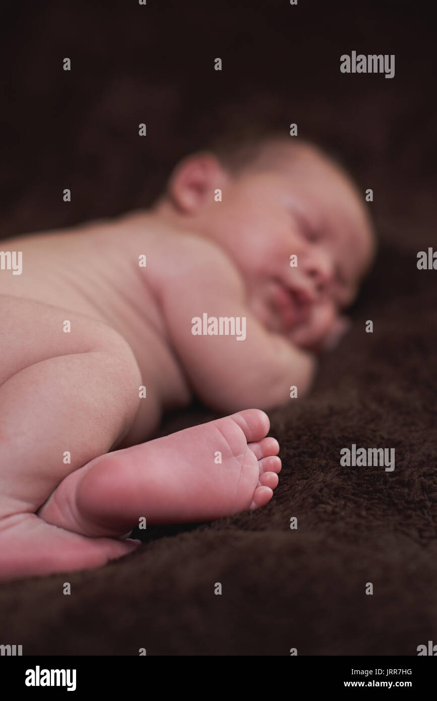 Barefoot of newborn baby close-up. Small feet of newborn Stock Photo