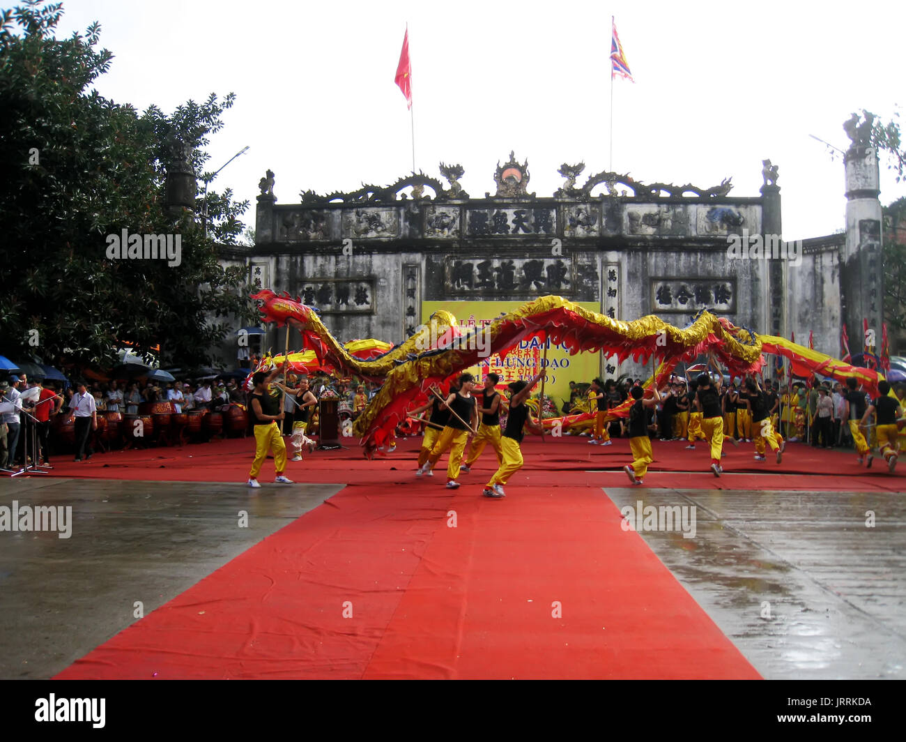 HAI DUONG, VIETNAM, February, 25: Group of people performance dragon dance at Con Son, Kiep Bac festival on February, 25, 2013 in Hai Duong, Vietnam.  Stock Photo
