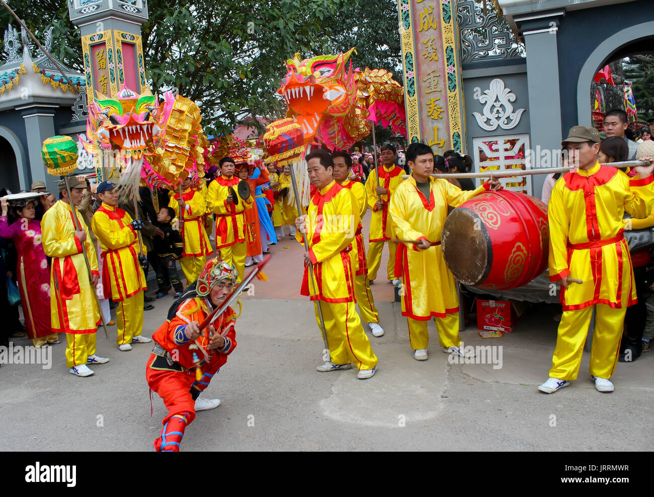 HAI DUONG, VIETNAM, March, 4: Group of people performance dragon dance at Cao temple festival on March, 4, 2013 in Hai Duong, Vietnam. Dragon dance is Stock Photo