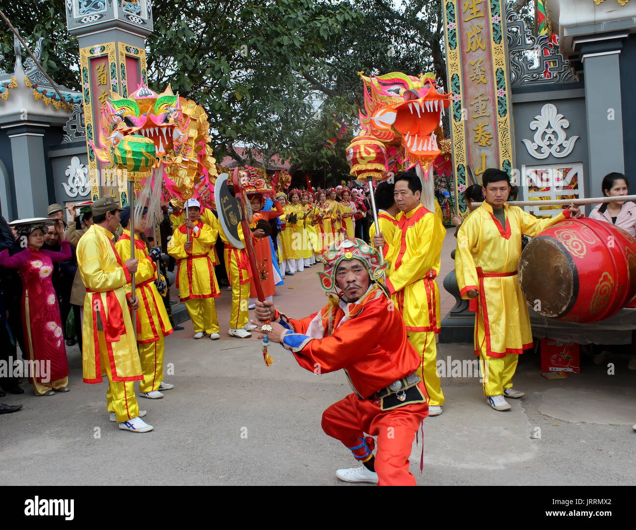 HAI DUONG, VIETNAM, March, 4: Group of people performance dragon dance at Cao temple festival on March, 4, 2013 in Hai Duong, Vietnam. Dragon dance is Stock Photo