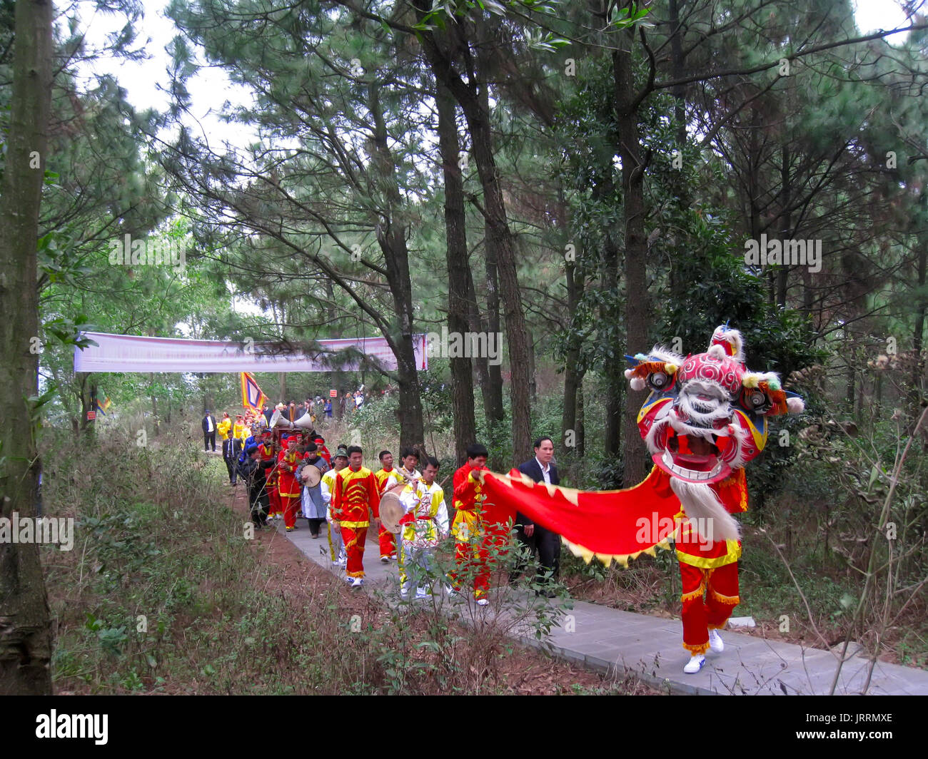 HAI DUONG, VIETNAM, February, 25: Group of people performance lion dance at Con Son, Kiep Bac festival on February, 25, 2013 in Hai Duong, Vietnam. Li Stock Photo