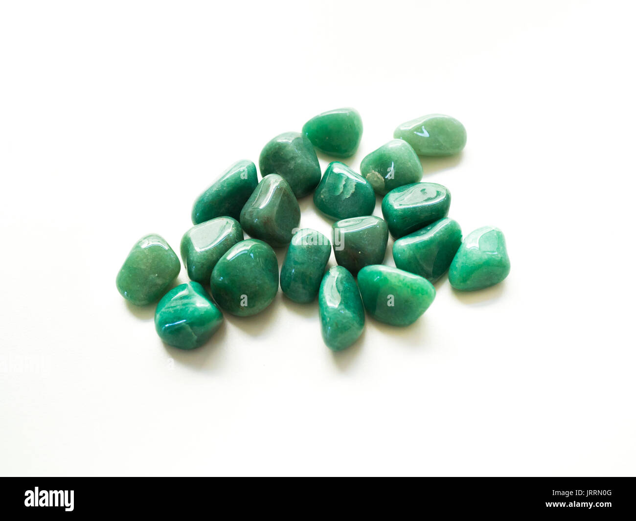 Tumbled aventurine stones for crystal therapy treatments and reiki detail Stock Photo