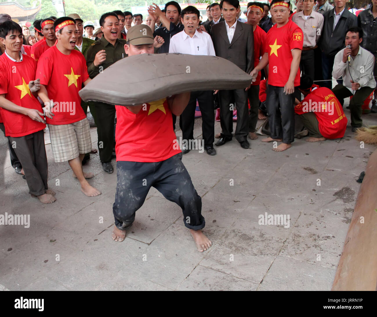 HAI DUONG, VIETNAM, February, 25: Vietnamese farmers play firecracker, wich made by land, unique folk game on February, 25, 2013 in Con Son pagoda, Ch Stock Photo