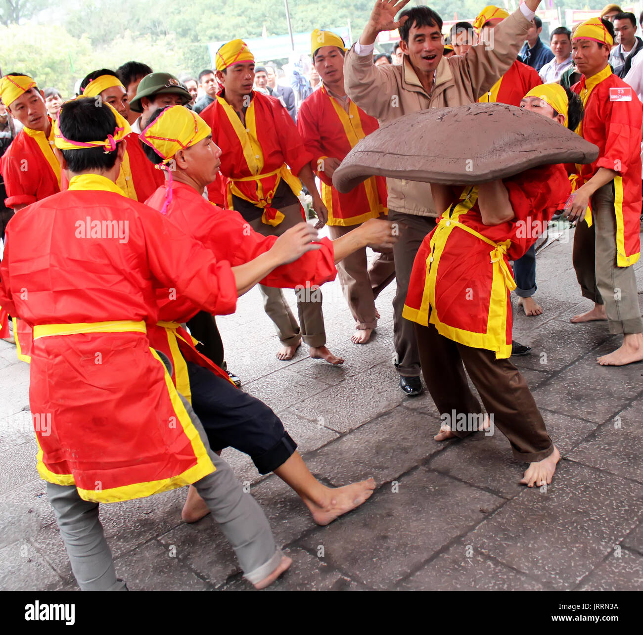 HAI DUONG, VIETNAM, February, 25: Vietnamese farmers play firecracker, wich made by land, unique folk game on February, 25, 2013 in Con Son pagoda, Ch Stock Photo