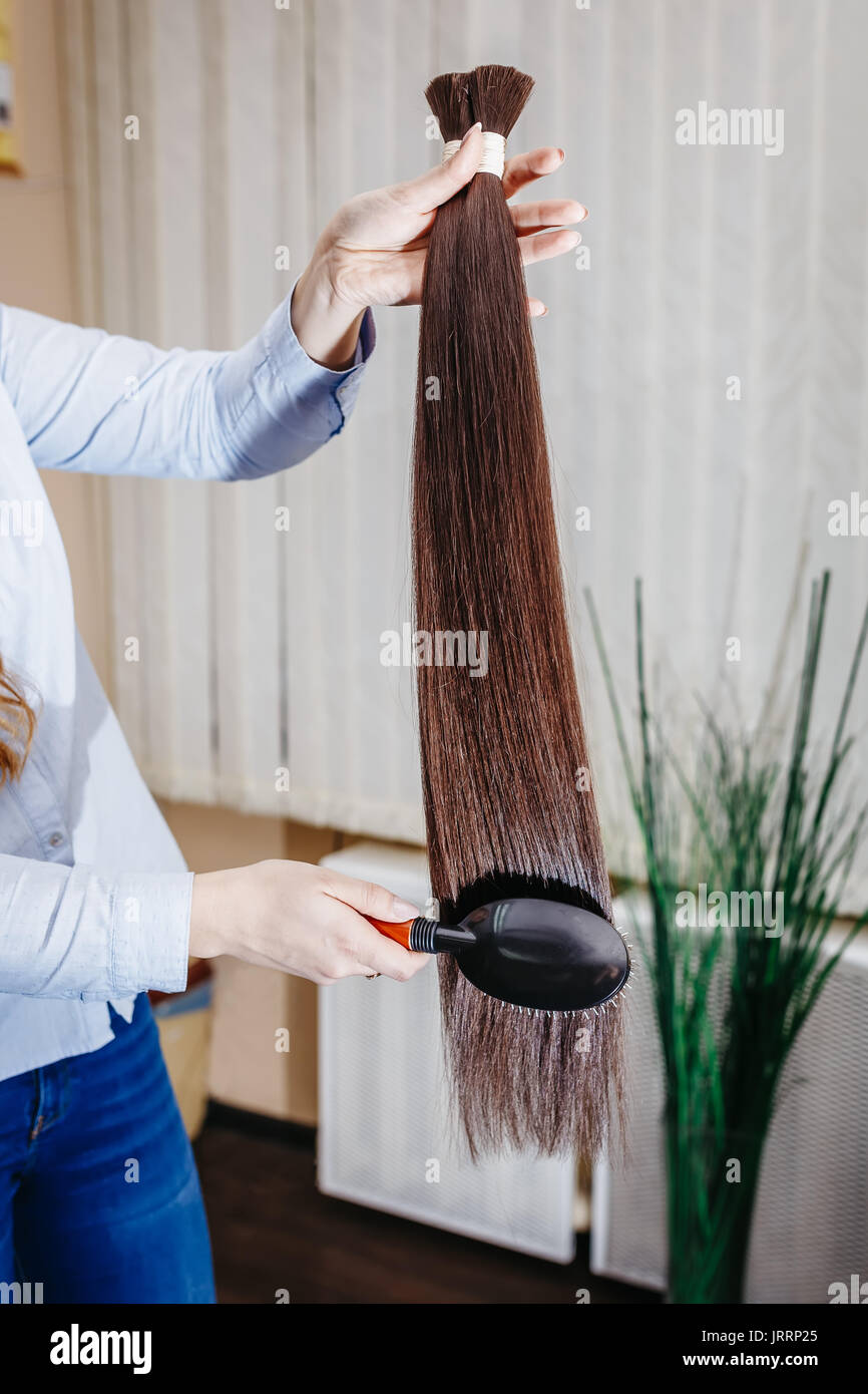 Brunette hair extension hi-res stock photography and images - Alamy