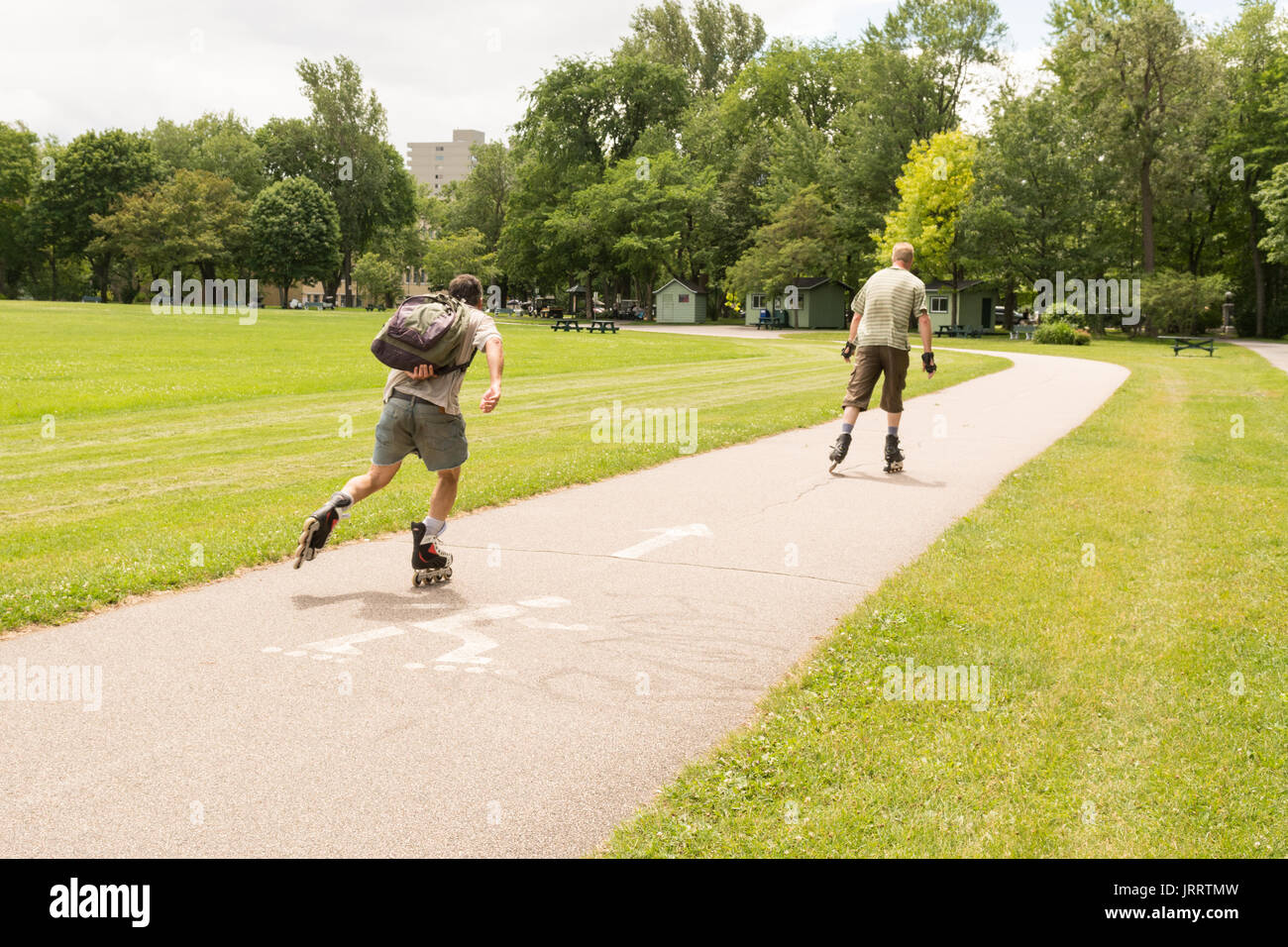 Two men Roller Blading at the Plains of Abraham, Battlefields Park, Quebec city, Canada Stock Photo