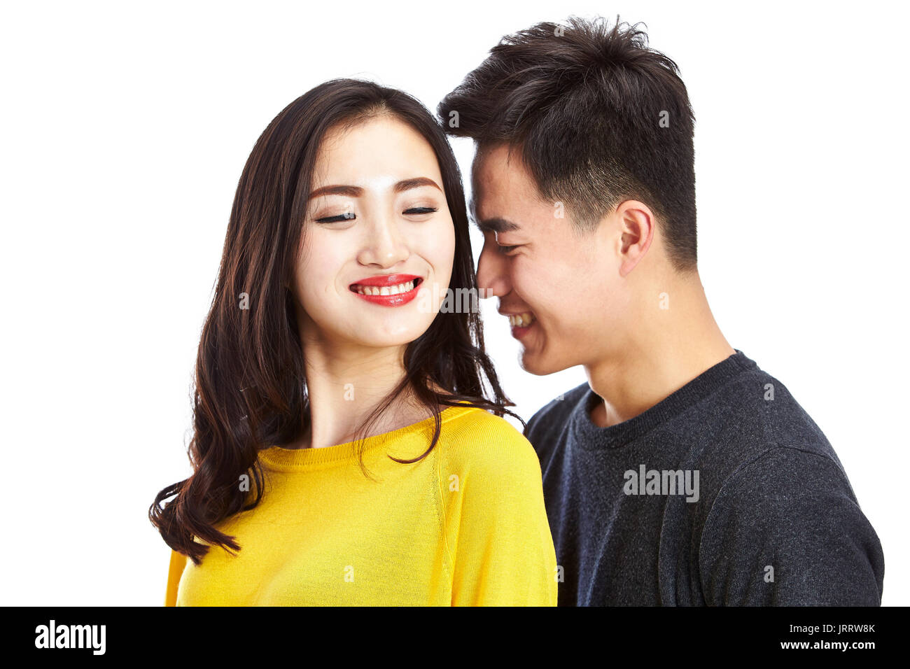 portrait of young and beautiful asian couple, isolated on white background. Stock Photo