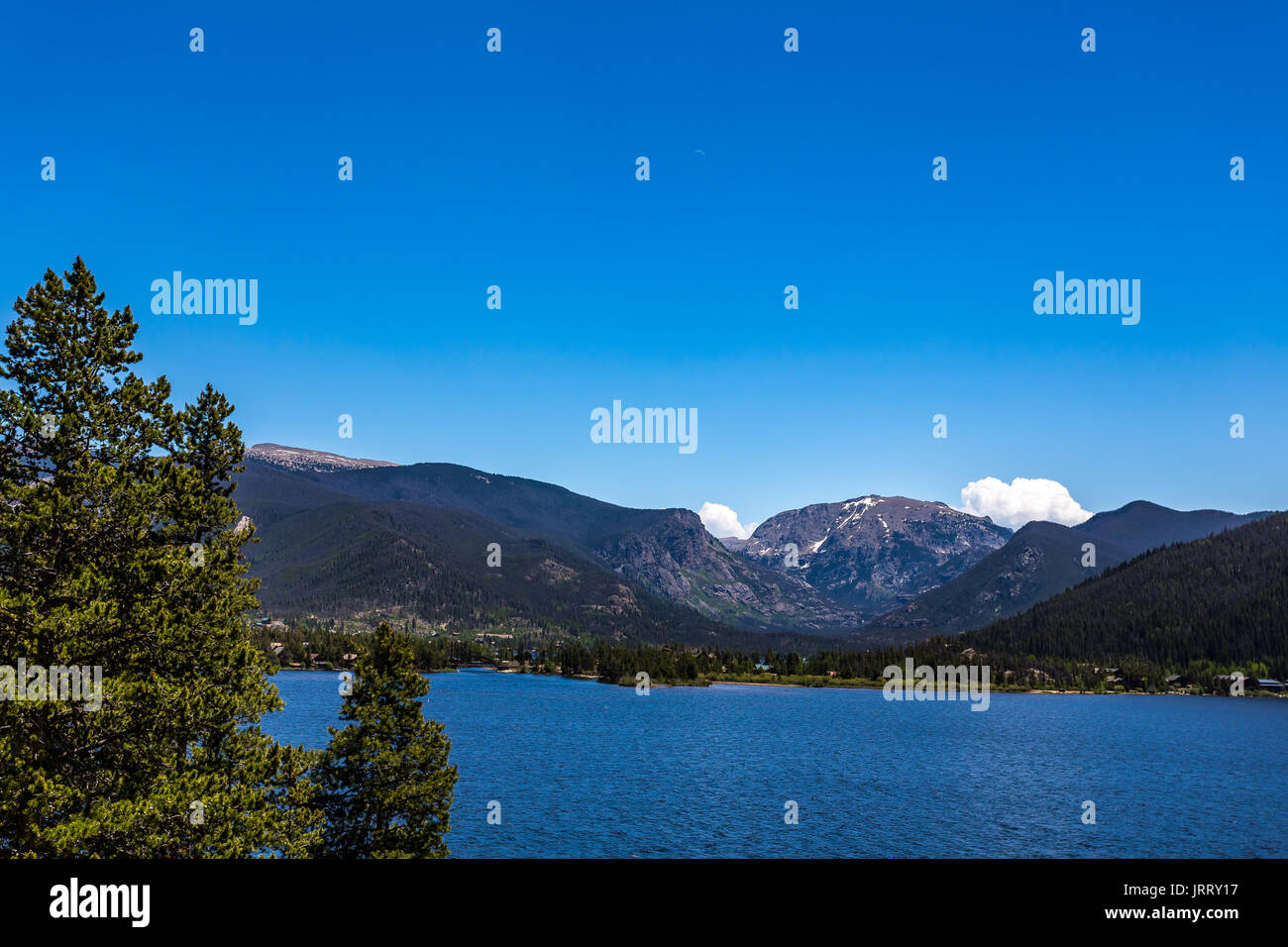 Grand Lake is Colorado's largest and deepest natural lake. Grand Lake was named Spirit Lake by the Ute Tribe because they believed the lake's cold wat Stock Photo