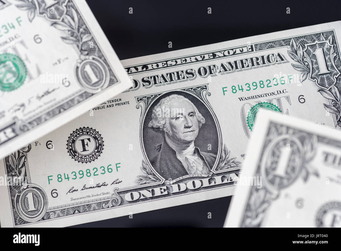 US / American $1 bills / banknotes. Metaphor Dollar exchange rate, value of US Dollar, US budget deficit, US banking crisis, the Biden economy. Stock Photo