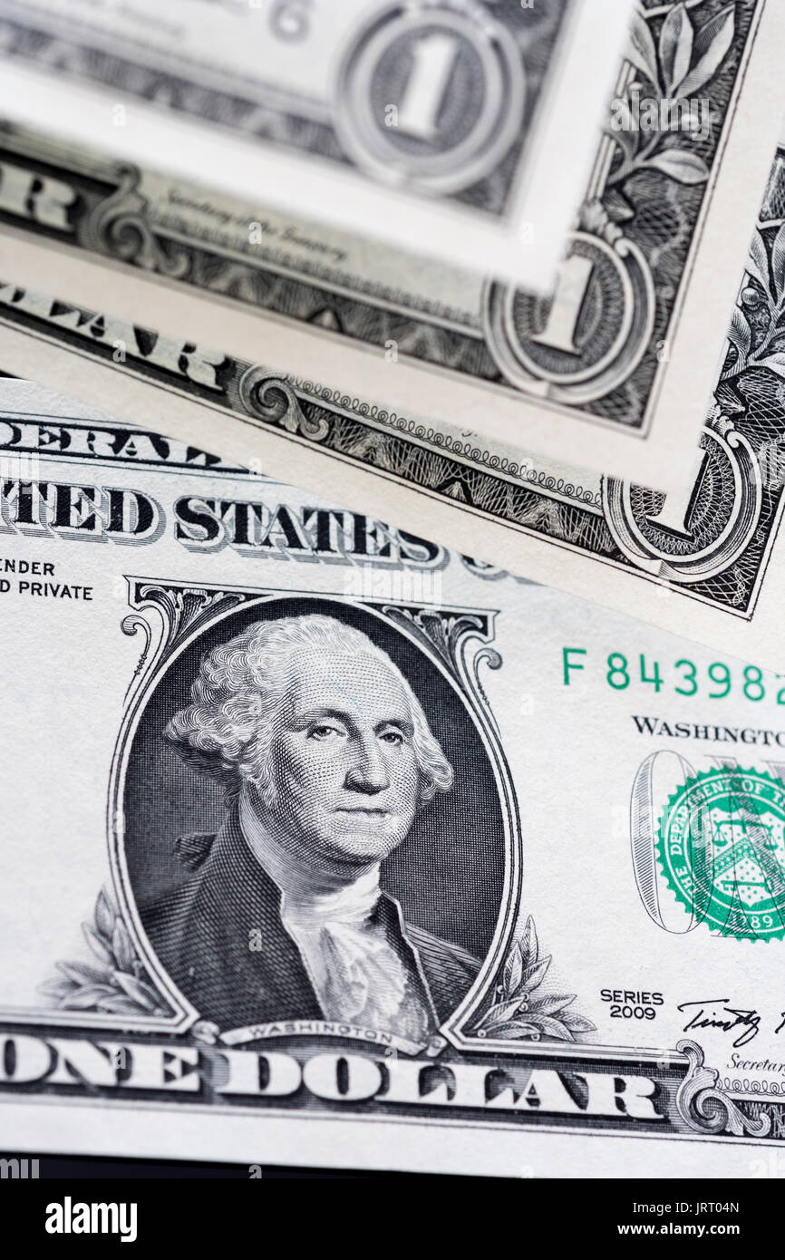 US / American $1 bills / banknotes. Metaphor Dollar exchange rate, value of US Dollar, US budget deficit, US banking crisis, the Biden economy. Stock Photo