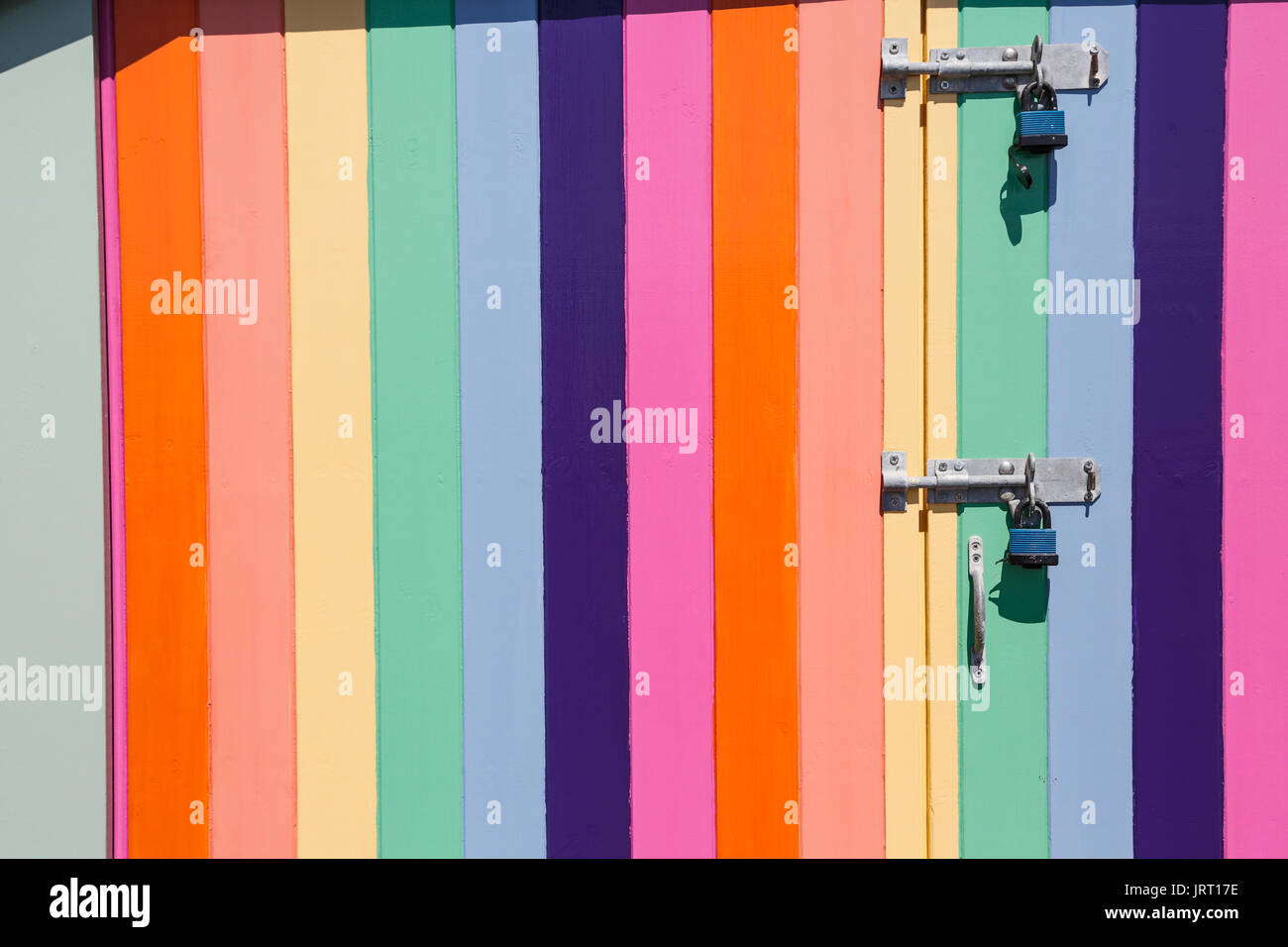 Rainbow painted beach huts on Pride weekend, Hove Stock Photo Alamy
