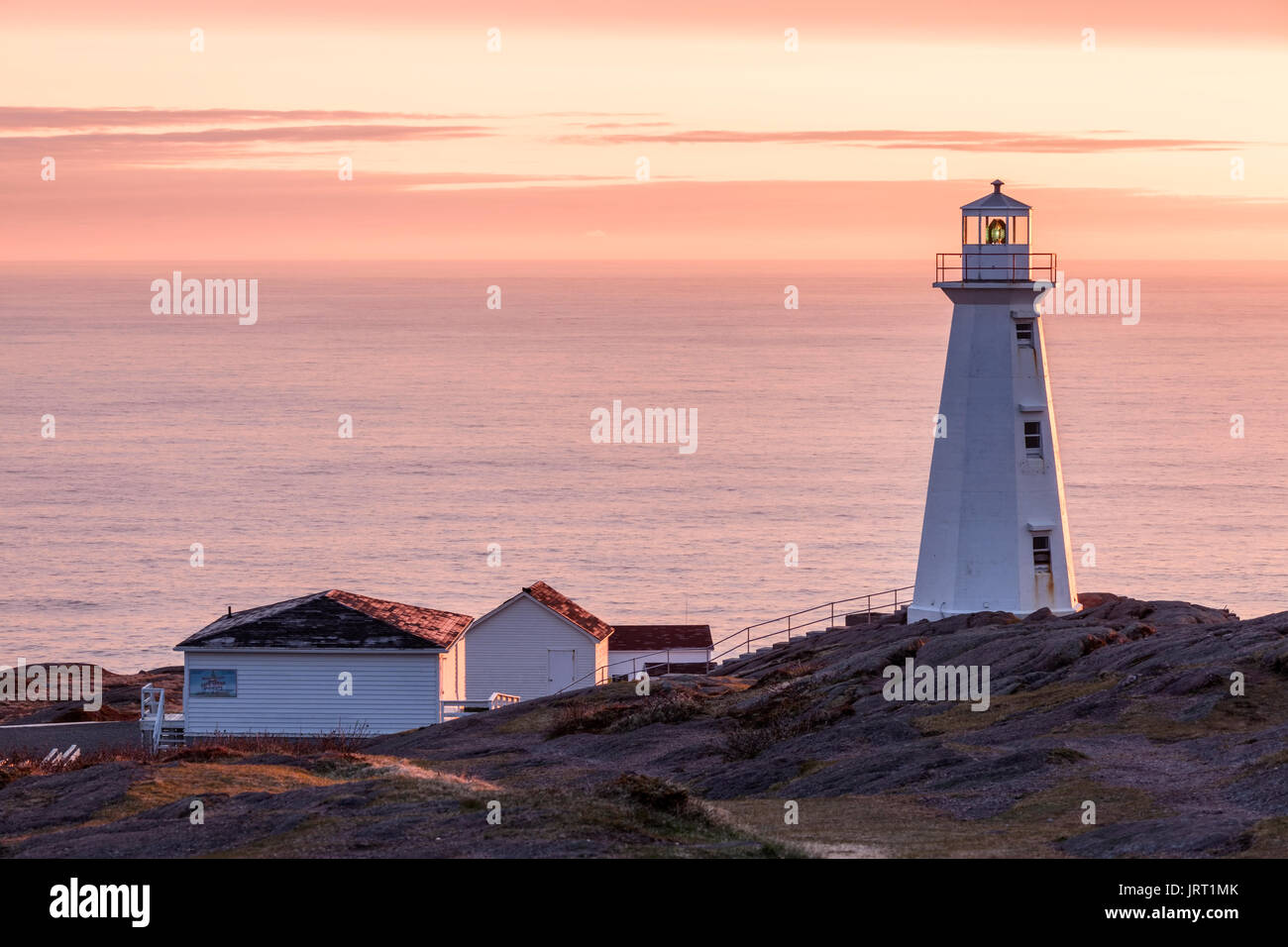 The 1955 concrete Lighthouse at Cape Spear National Historic Site of Canada at sunrise. Cape Spear, St. John's, Newfoundland and Labrador, Canada. Stock Photo