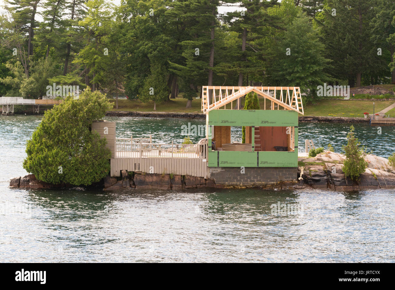 Thousand Islands new building under construction on tiny island,  Canada Stock Photo