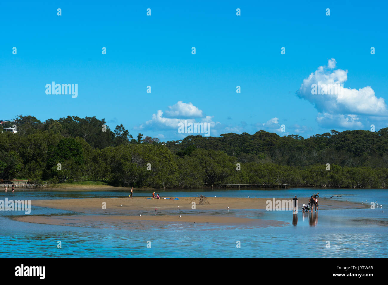 Coffs creek reaches the see at Park beach holiday park, Coffs Harbour, NSW, Australia. Stock Photo