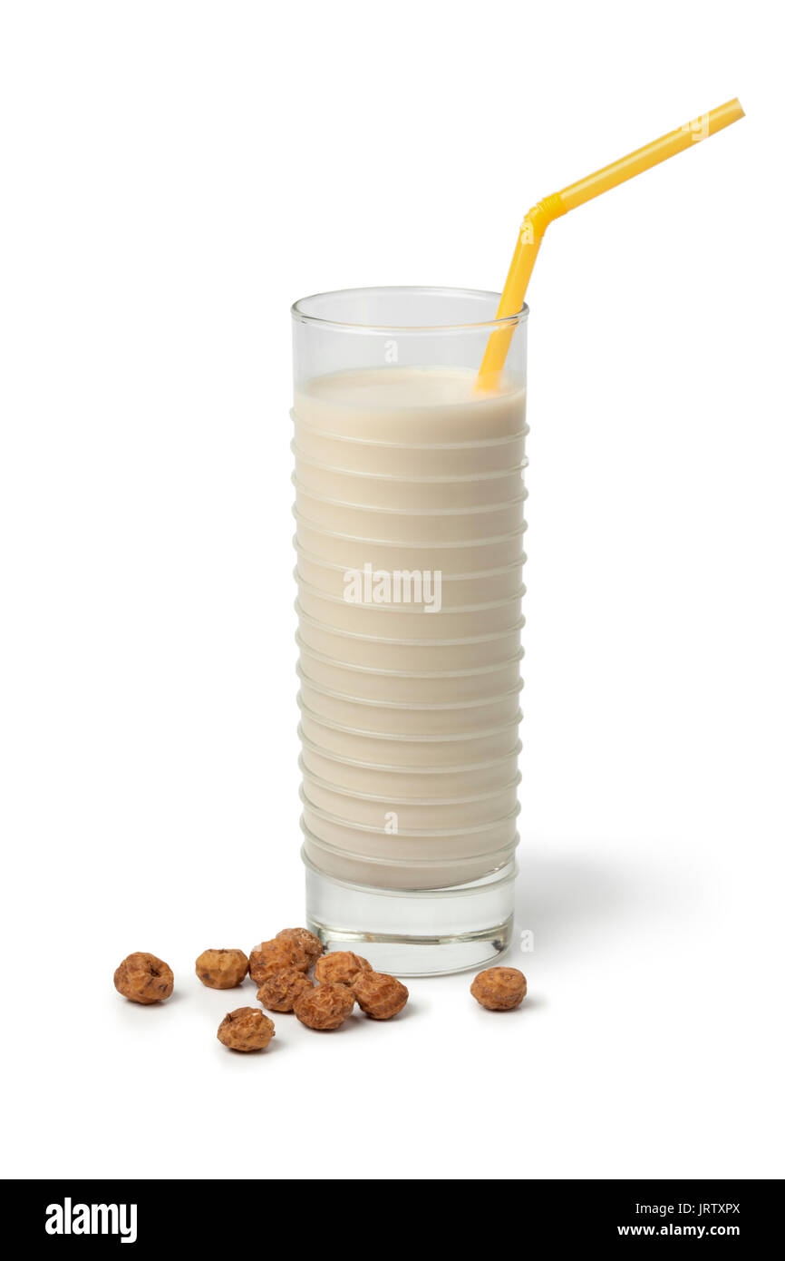 Glass Horchata milk and shelled chufa nuts on white background Stock Photo