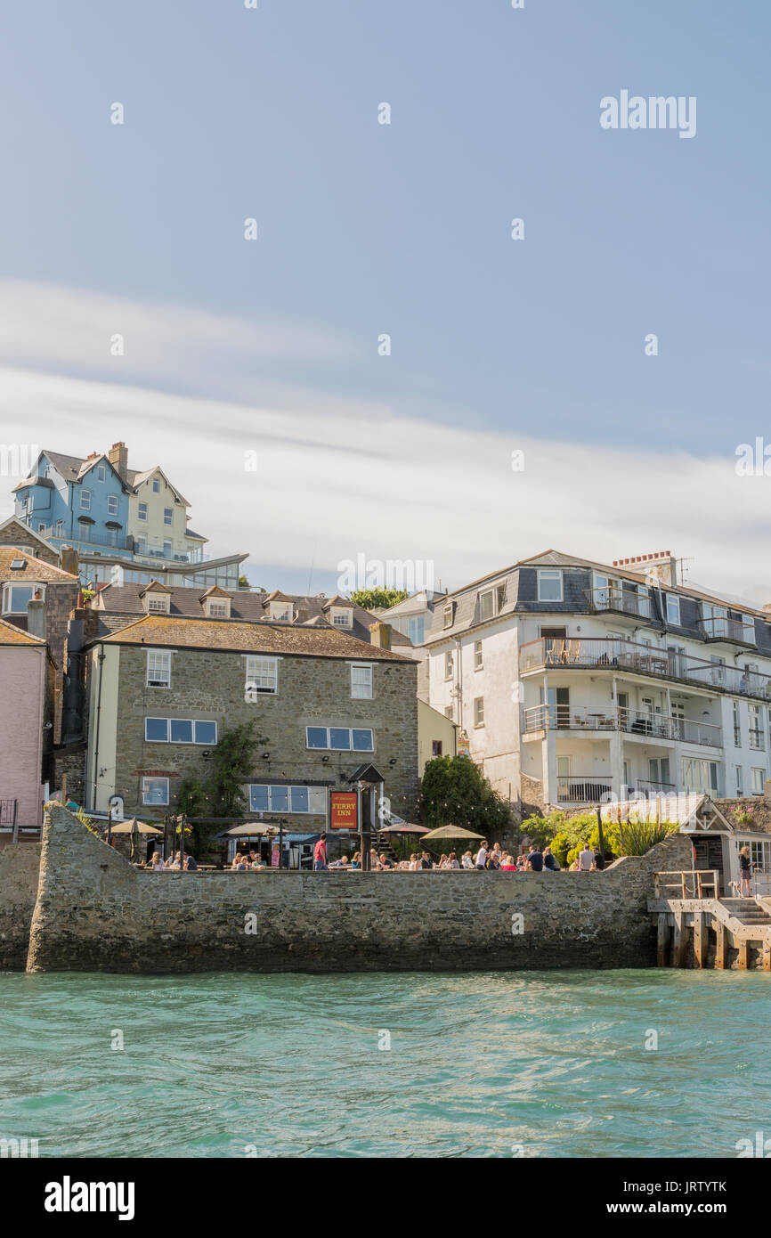 The Ferry Inn Public House on the waterfront between other properties