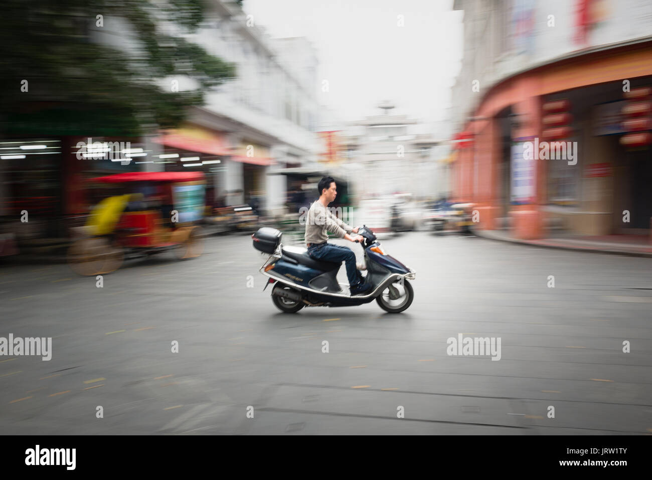 Chinese scooter rider hi-res stock photography and images - Alamy