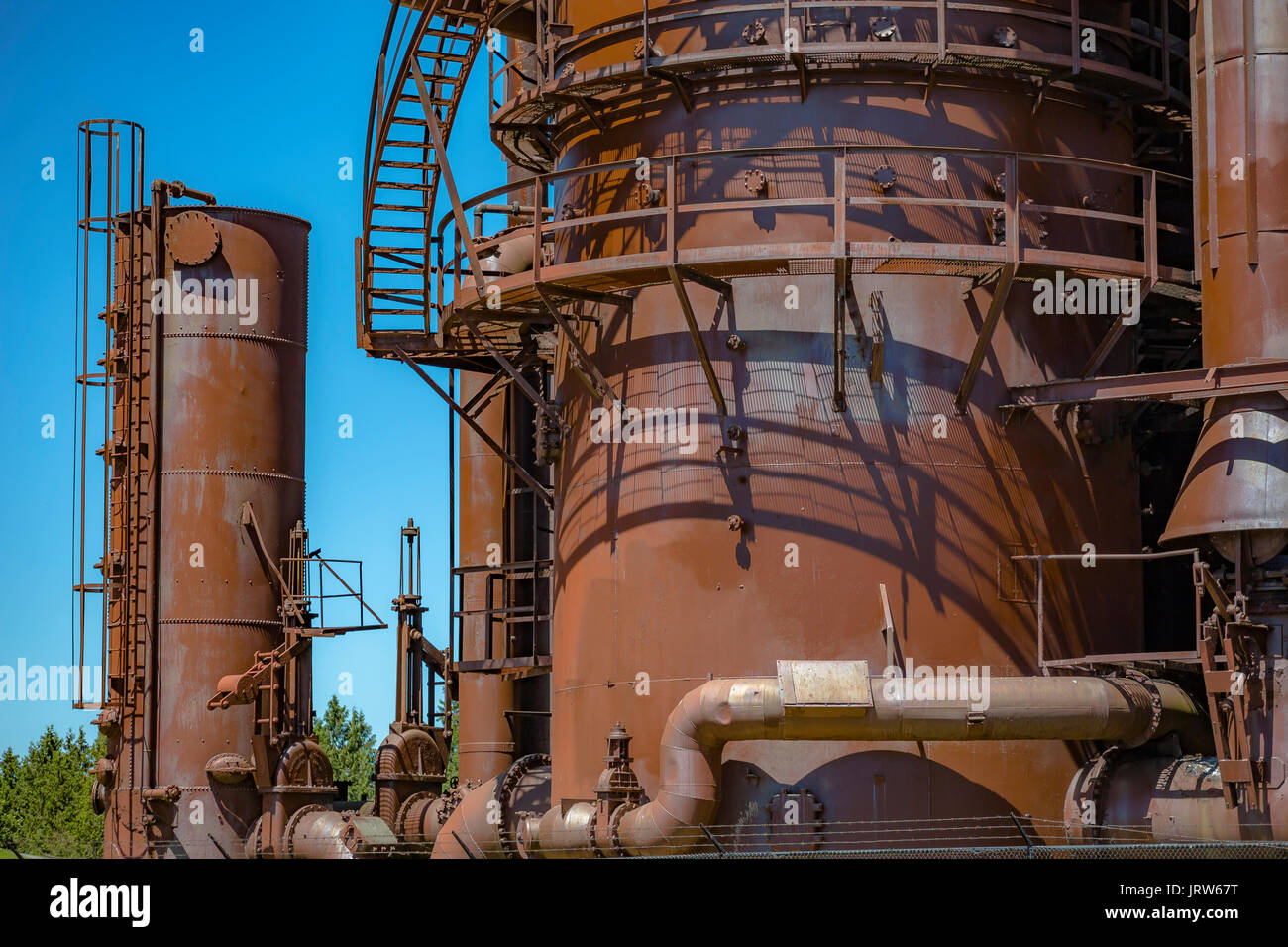 Abandoned old machines and storage units in a gas industry at gas works